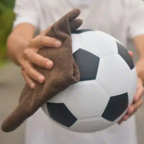 clean football with soft fabric