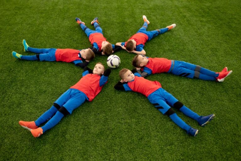 Croatia kids laying on grass