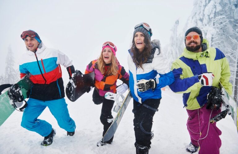 Norway Two couples having fun and snowboarding