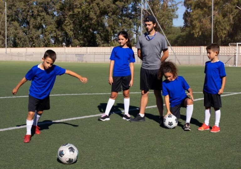 Portugal man training kids football players